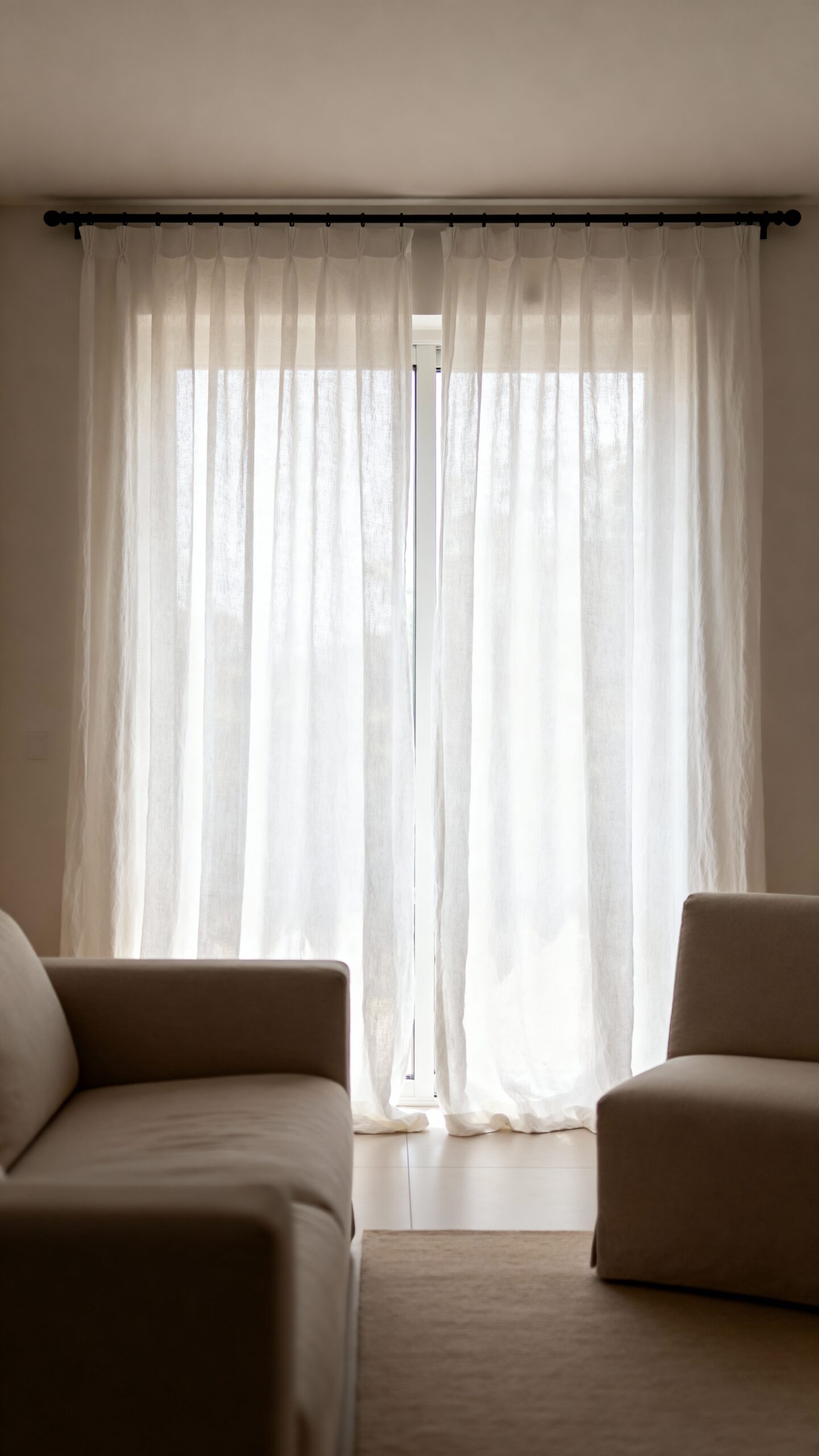 elongate windows with high wide curtains