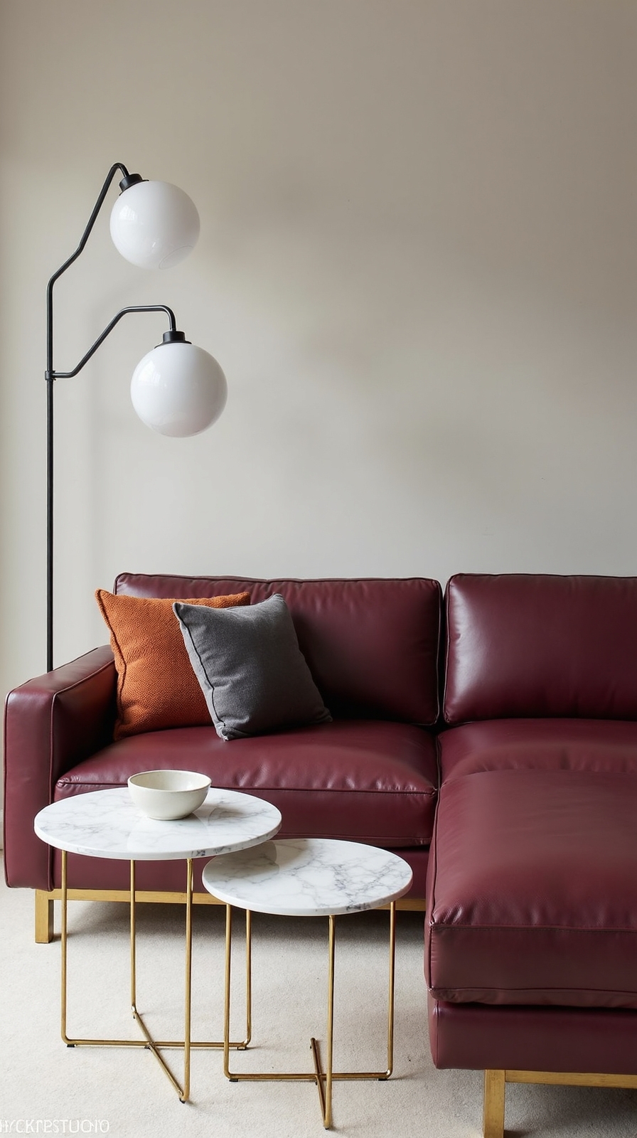 sophisticated burgundy leather brass marble accents