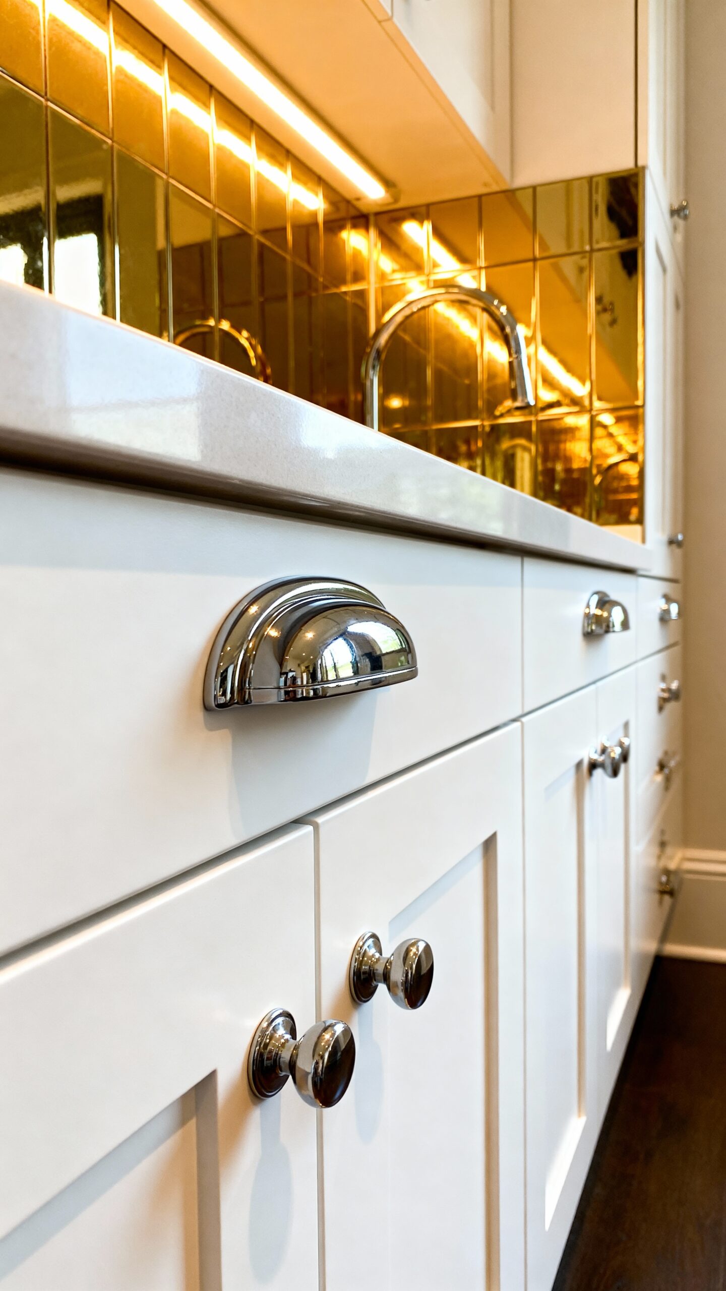 reflective cabinet hardware brightens small kitchens