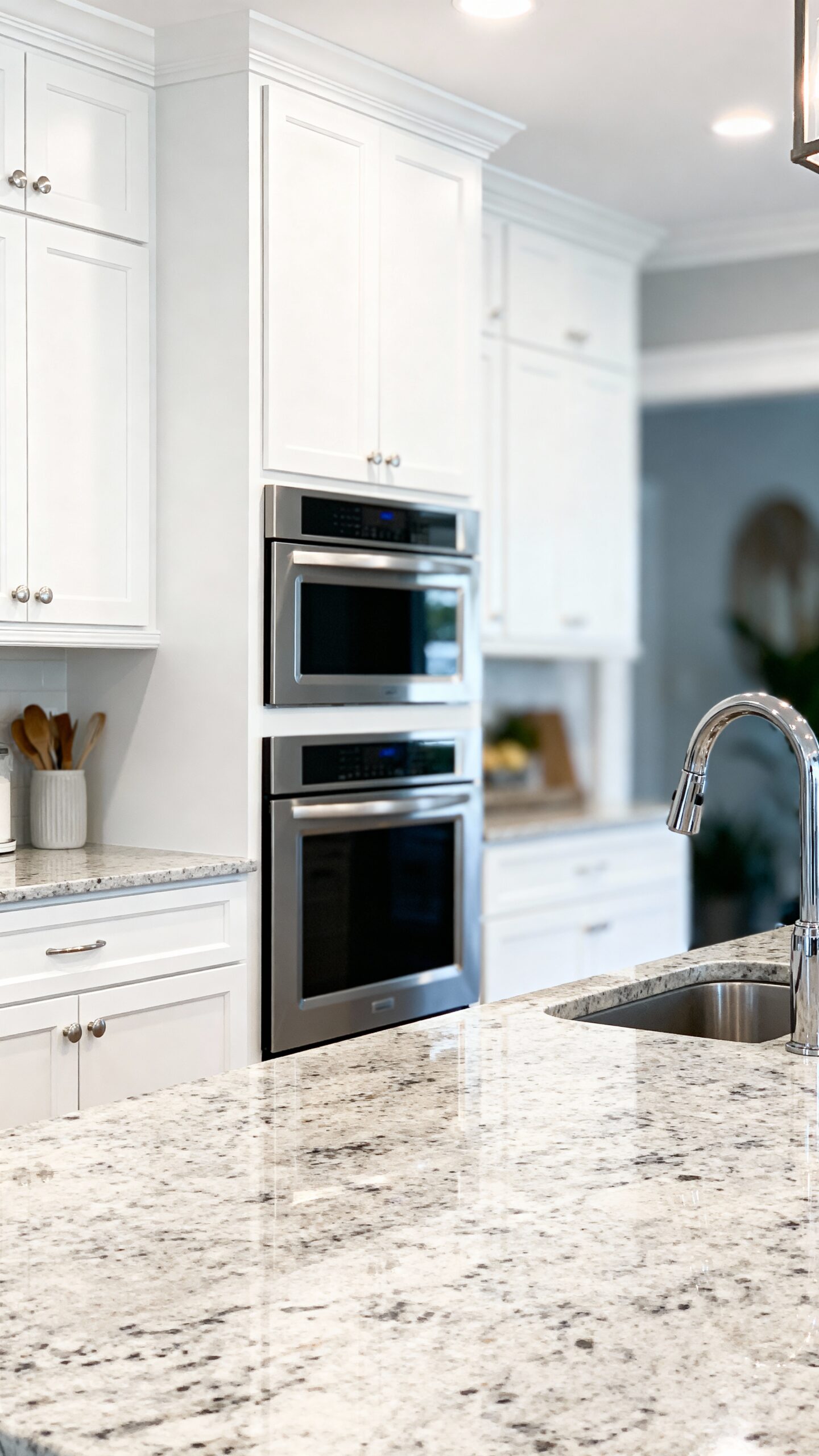 seamless kitchen design integrated appliances white cabinets